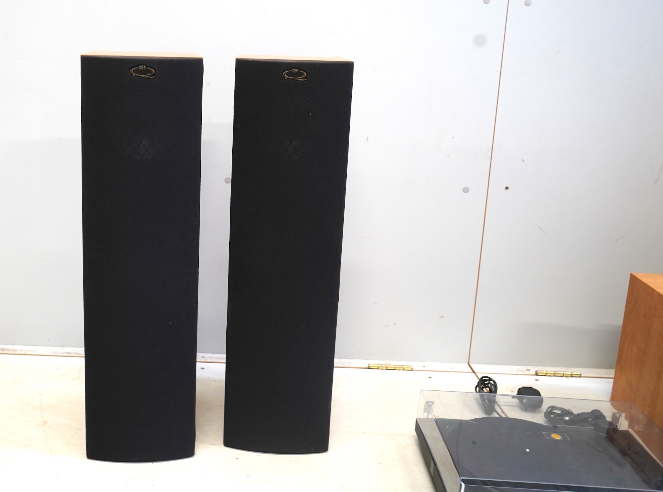 Two pairs of KEF stereo speakers; a pair of floor standing Q35.2 speakers and a pair of Q15.2 shelf speakers, together with a Pro-Ject Debut II turntable record player, serial number 008033, and a Yamaha Stereo Cassette